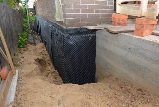 SJ Waterproofing Pros technician performing targeted Emergency Waterproofing assessment in Quinton, NJ